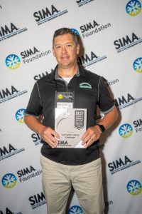 Mike accepting SIMA Award with Carrington Lawn & Landscape in Middleton, WI